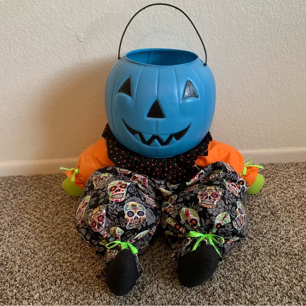 Handcrafted trick or treat pumpkin candy pail sitting shelf decor doll skull